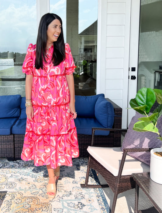 Pink floral print midi dress with sleeves front view 