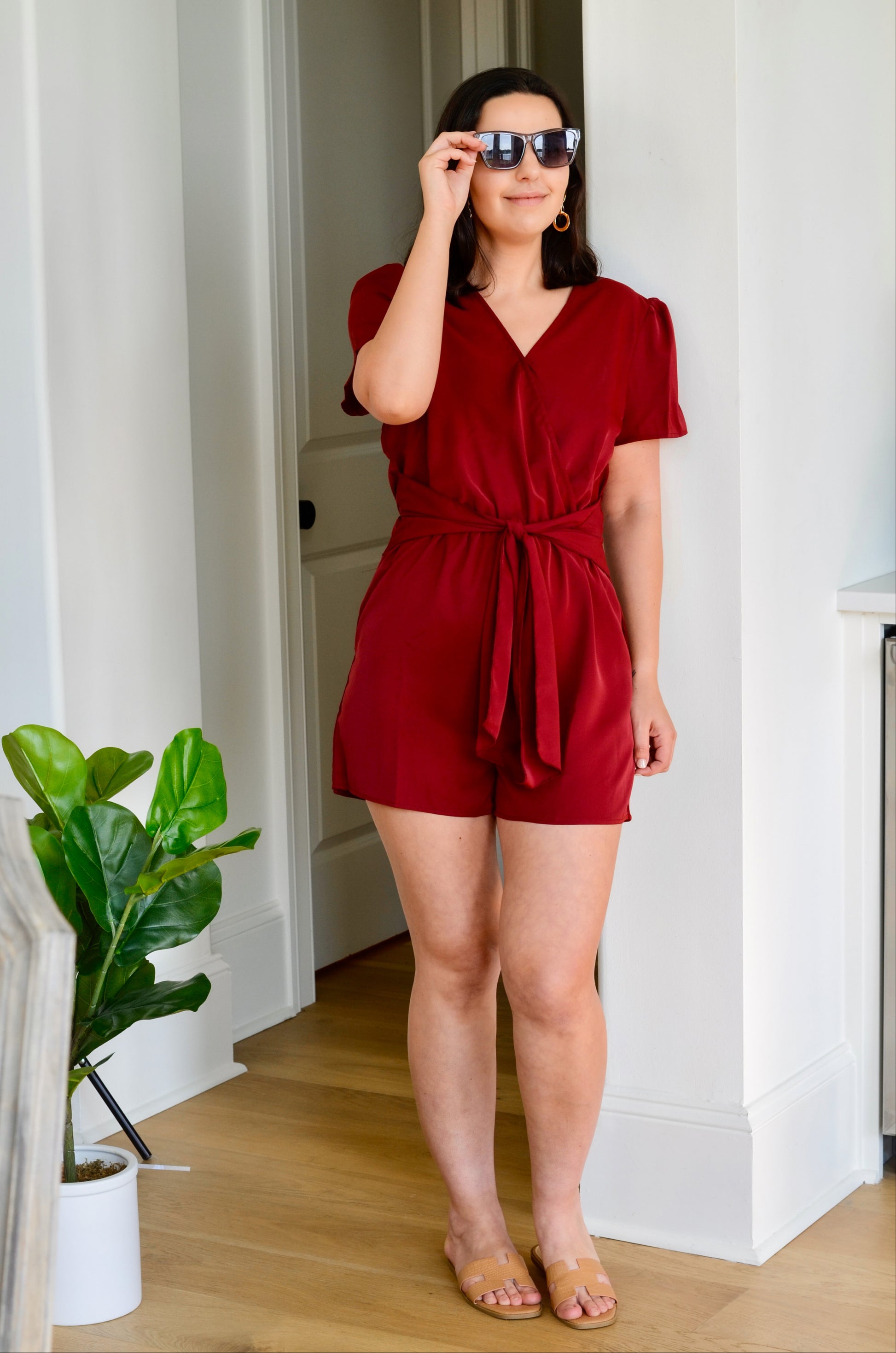 Front of burgundy romper with tie at the waist 